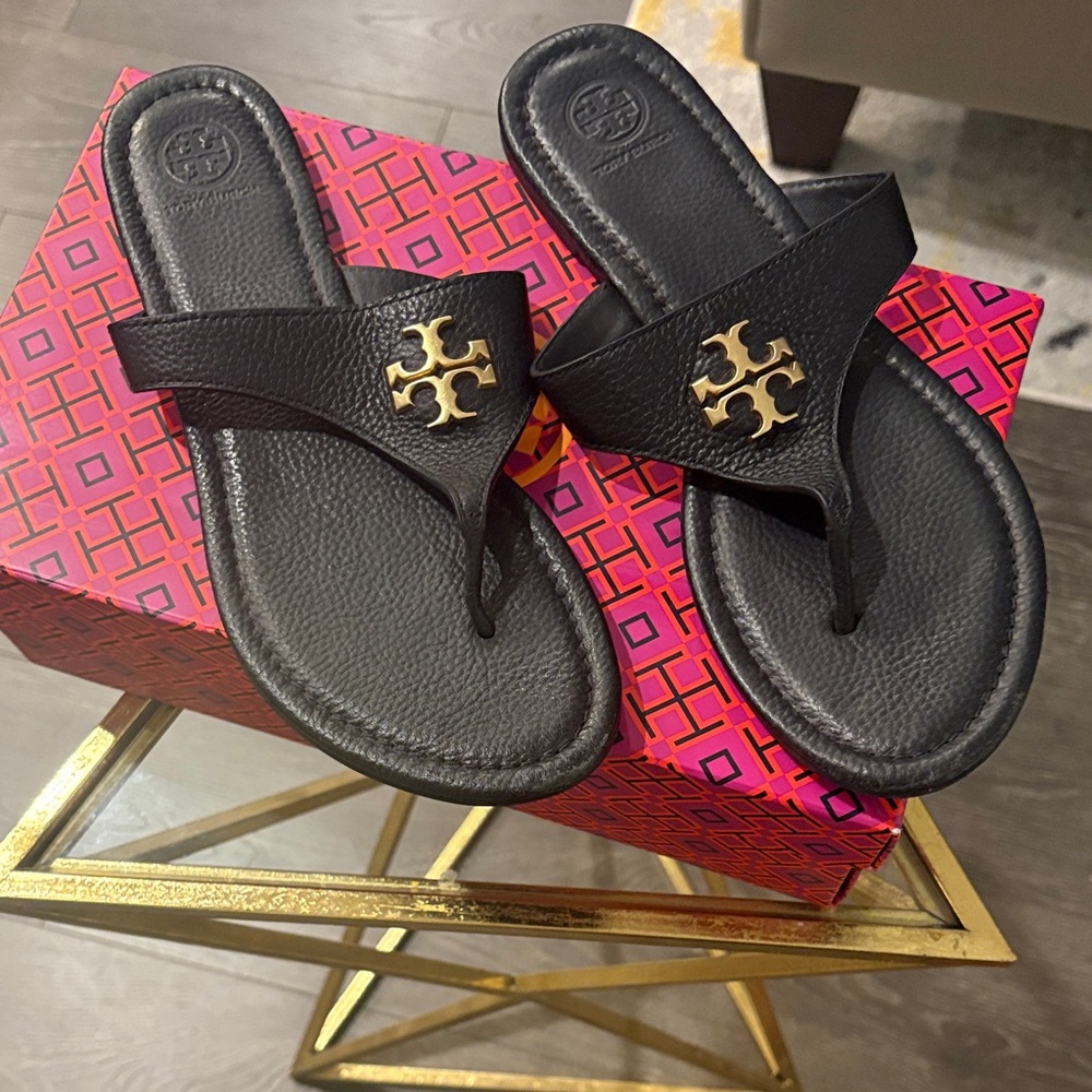 Tory Burch Black Flip Flops with Gold Emblem